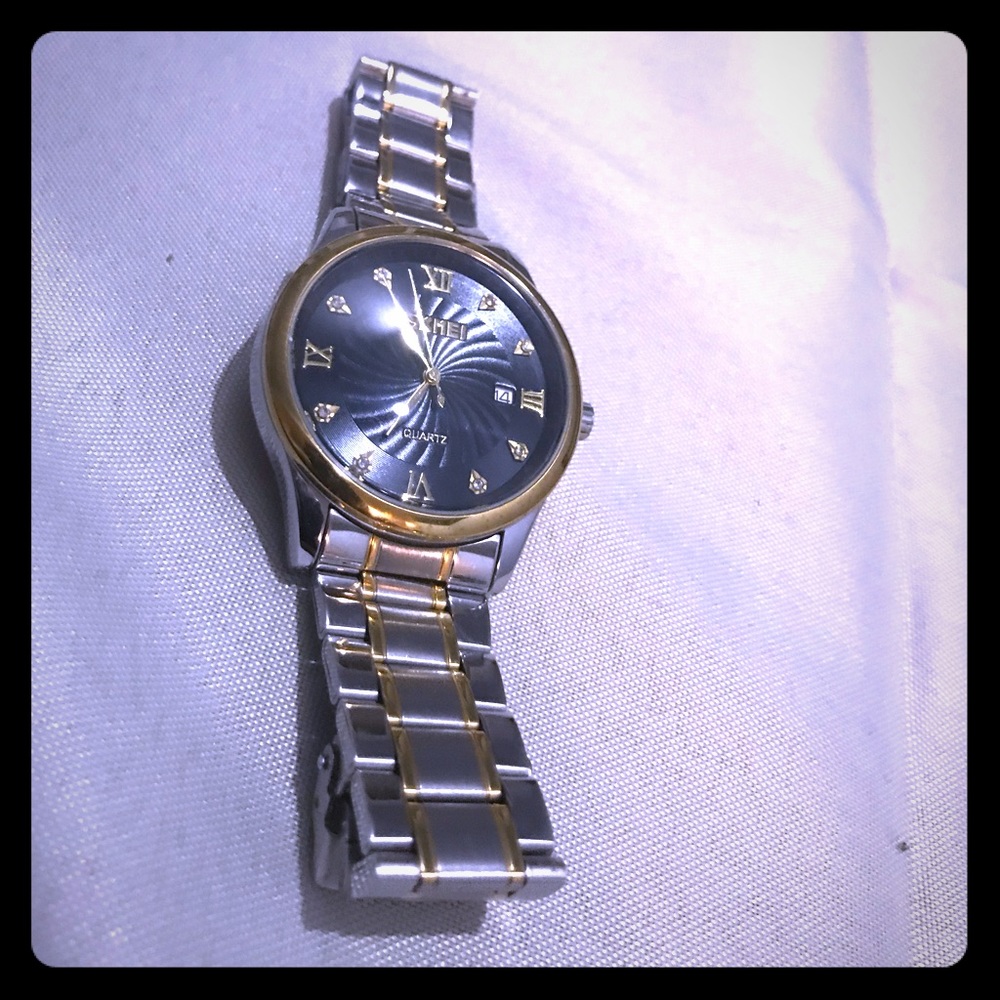 SKMEI watch - silver , gold color trim, black face